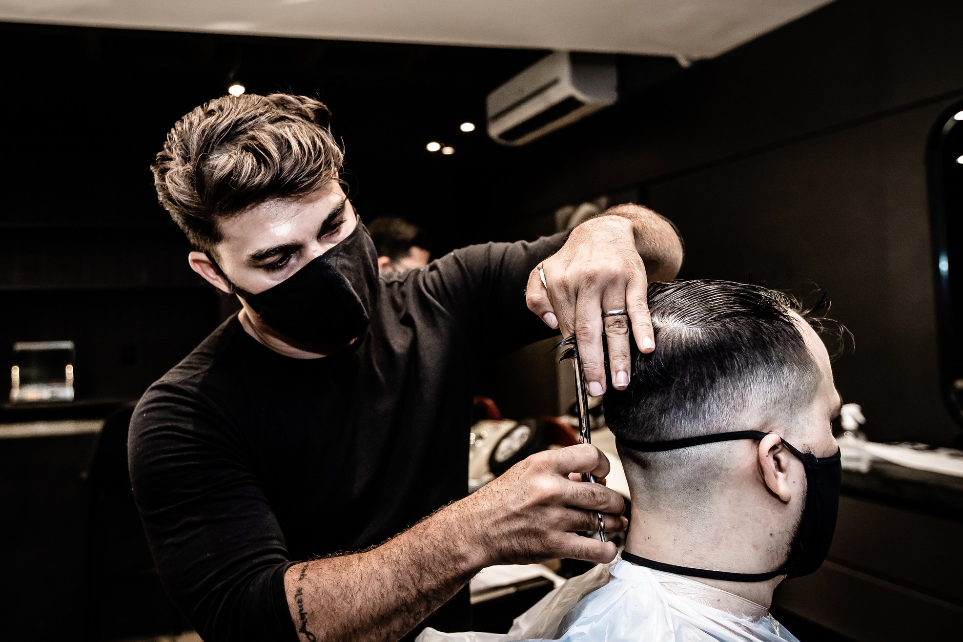 A Barber Cutting Hair